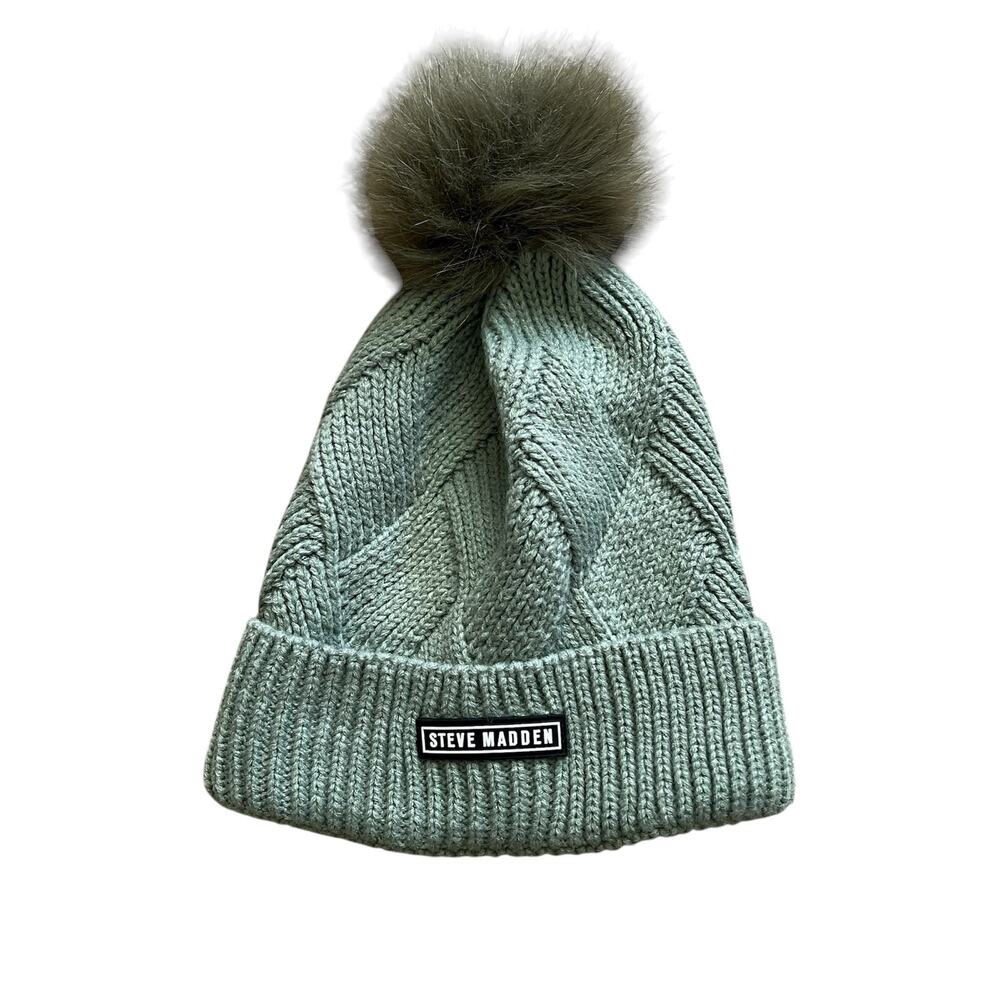 Steve Madden light green cable-knit beanie with a faux-fur pom-pom